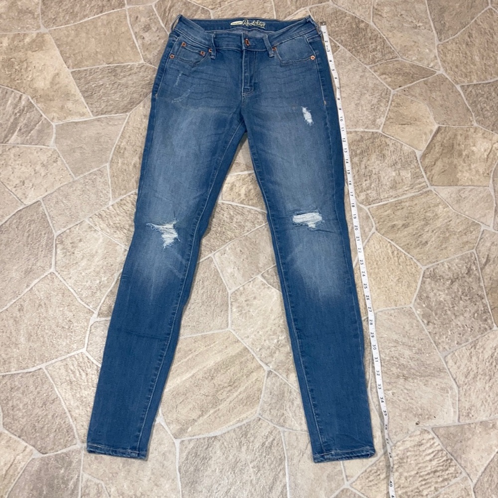 Light denim distressed jeans….